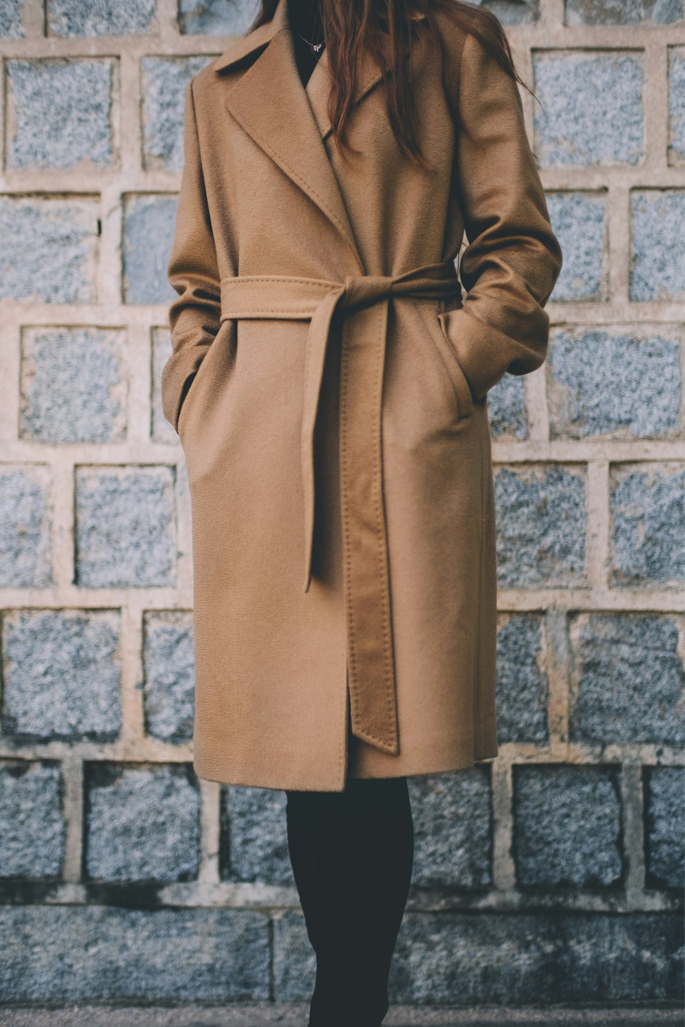 Camel wool coat with architectural shoulders